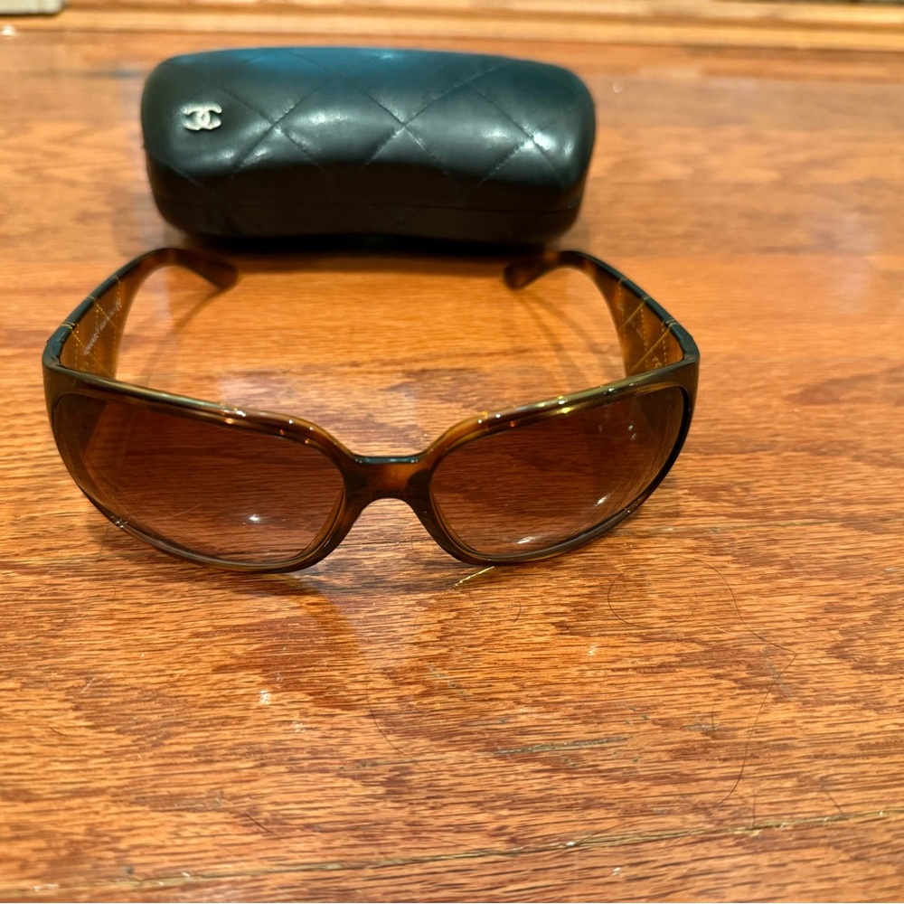 CHANEL Black Quilted Sunglasses Case with Chanel sunglasses.